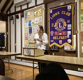 BAHS student Maiara Rebordao speaks to the Belfast Lions Club. (Photo by Karen Varney)