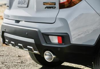 The TrailSport’s distinguishing features are cosmetic, such as these big-bore pipes, compact bumpers, orange badging and faux skid plates. They set the new model apart from the legions of other two-row crossovers out there.