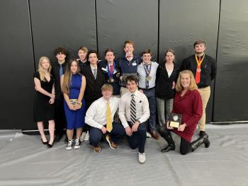 Back row from left: Meta Wiseman, Oliver Carbisiero, Kiara Krumbholz, Andrew Donald, chapter co-president Sebasian Krumbholz, Max Provencher, Eli Law, Ellis Braga, Rosa Estes, Chapter Treasurer Tim Smith. Front row, from left: Easton Cox, chapter co-president Cole Ellis and chapter adviser Jennifer Rich.