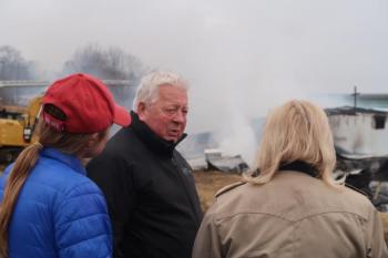 Penobscot McCrum CEO Jay McCrum speaks with Belfast City Manager Erin Herbig, left, and Governor Janet Mills.