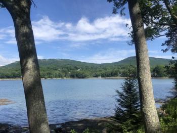 The view from the public right-of-way at Sherman’s Cove, toward Mount Battie, in June 2021. (Photo by Lynda Clancy)