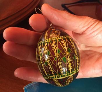This egg with hearts, pussy willows (spring), and never ending lines of eternal life on a blood red canvas of hope and passion; dotted in green for hope, spring, breaking bondage; yellow for the stars, moon and sun, harvest, and the perpetuation of family. LISA KRISTOFF/Boothbay Register