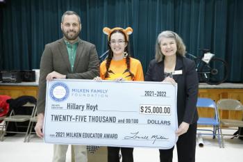 Zachary Schmesser, district representative for Maine U.S. Representative Jared Golden, and Christina Breen, regional representative for Maine U.S. Senator Angus King, congratulate Hillary Hoyt on her Milken Educator Award. (Courtesy Milken Family Foundation)