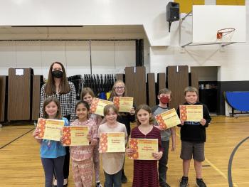 Principal Ainslee Riley presents the Responsibility Award to (front) Swayze Prior, Isabella Guzman, Brooklyn Gamage, Alyvia Baughman (back) Greta Stinson, Naomi Thompson, Maden Jovin, and Nolan Sprowl.