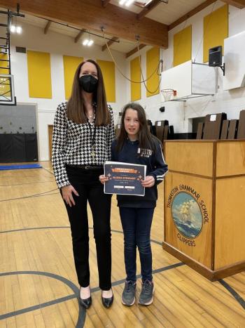 Principal Ainslee Riley presents Alora Stewart with the Principal’s Award.