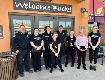 Rockland Chief Neal, Officer Pritchette, Officer Peasley and Applebee's management and staff. (Photo courtesy Troy Peasley)