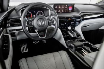 Acura always subsumes luxury beneath function and utility, but it’s there—the power-adjustable, heated wheel, the heated, ventilated, massaging and widely power-adjustable seats with extendable bottoms, the head-up display, the computer touchpad (with wrist rest) and more.