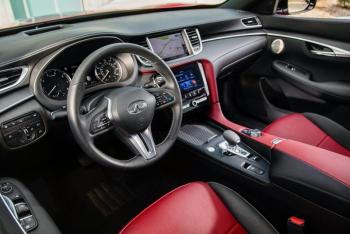 The QX55 has dual high-res touchscreens plus Apple CarPlay, Android Auto and four USB ports (one Type-C, three Type-A), but no inductive phone charger. The Sensory trim package includes Bose Performance Series audio with 16 speakers and the ProPILOT semi-autonomous driving system.
