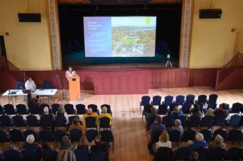 Emily McConnell, of the NewHeight Group, describes the plan to Rockport residents gathered at the Rockport Opera House June 8.