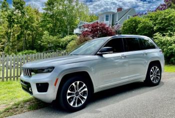 The redesigned Grand Cherokee is longer, wider, taller and more expensive than its predecessor. This color is Silver Zynith over Global Black.