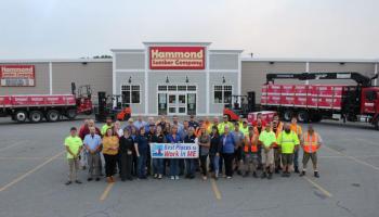 Hammond Lumber Company employees hold a 2022 Best Places to Work in Maine banner. The 2022 Best Places to Work in Maine list is made up of 100 companies in three size categories: 34 small winners (15- 49 U.S. employees), 45 medium winners (50-249 U.S. employees) and 21 large winners (250+ U.S. employees). (Photo courtesy Hammond Lumber Company)