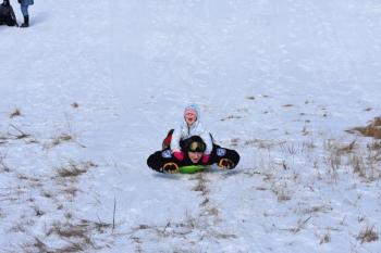 Sarah Thompson earned a third place award for the People Photo category with her photo taken last winter when Rockland Police joined children for an afternoon of sledding in Rockland: “Snowpants, badges, fun on Rockland’s sledding hill.”