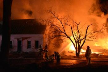 Sarah Thompson earned first place for Spot News Photo of a devastating house fire on Hope Street in Hope, January 2022.