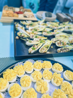Hors d’oeuvres included Deviled eggs from French & Brawn and Sweet Corn Shrimp Endive Cups from 16 Bayview