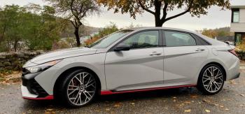 Hyundai’s all-new sports sedan occupies a sweet spot between versatility and fun, an identity perfectly expressed here in Cyber Gray with red accents, aero widgets fore and aft, and spidery 19-inch alloy wheels with Michelin Pilot Sport 4S tires.