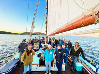 42 Friends of S.E.A. enjoy a sunset cruise aboard Schooner Appledore