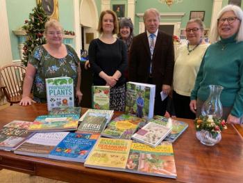 Pictured left to right: Sharon Davenport, cochair of the BGC books
committee; Tiffany Howard, Left Bank Books co-owner; Stephanie Holman, Belfast Free Library children’s librarian; Steve Norman, Belfast Free Library director; Barbara Gage, president of the Belfast Garden Club; and Lee Graham, co-chair of the BGC books
committee. (Photo courtesy Belfast Garden Club)