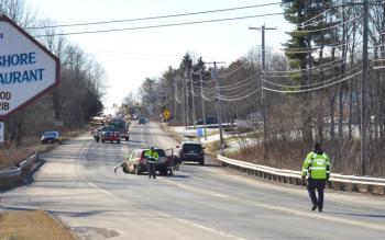 A stretch of Route 1 near the entrance of Pen Bay Medical Center was closed for 45 minutes Jan. 11 while firefighters extricated drivers from their vehicles and ambulance crews tended to them. (Photo by Lynda Clancy)