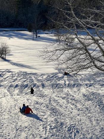 Recent snowfall finally opened local hills up for sledding. (Photo by Tracee O’Brien) Sledding