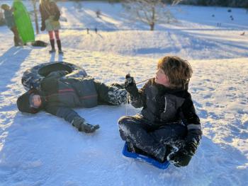 Only one local hill has a lift, and it is not open to sledding. Dragging your sled up can be exhausting. (Photo by Tracee O’Brien) Sledding