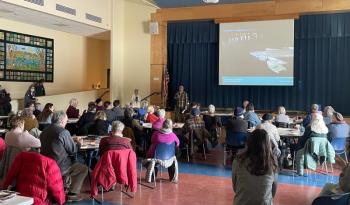 Selectboard member Steve Hand introduces Heart and Soul to an assemblage of townspeople on Sunday, February 5. (Photo by Ed O’Brien Imagine
