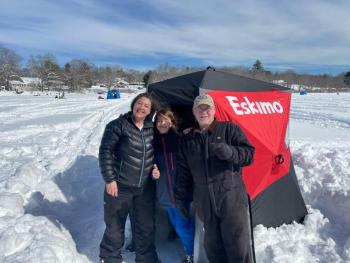 Allan Moeller, Tracee O’Brien, and Andy O’Brien in front of their insulated ice tent at Norton’s Pond. (Photo by Ed O’Brien) Ice Tent