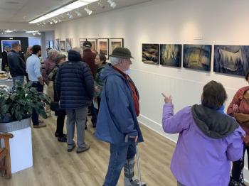 Bruce MacDonald spends some time with Elizabeth Root Blackmer’s collection. BRAF photo