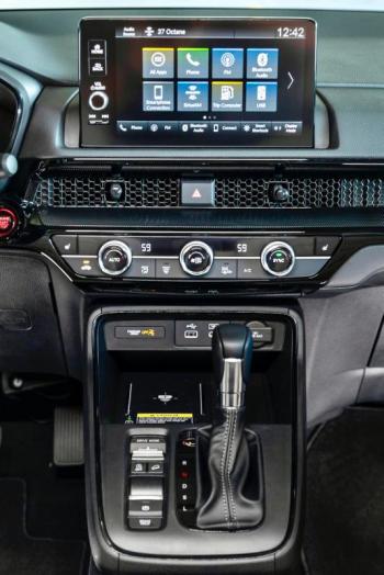 Inside, the new CR-V is pure Honda—highly space-efficient, well-sorted ergonomically, with plenty of storage spaces and featuring surfaces that look and feel good. This is the Sport Touring’s 9-inch touchscreen.
