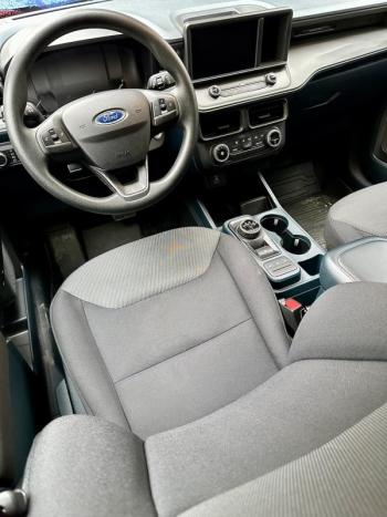 Basic but comfortable, functional, well laid out and not unattractive. The Maverick XL doesn’t pretend to be something it’s not. Note the rotary gear-selector and the electric e-brake switch.