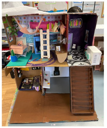 Emma, Ruby, Christine and Scarlett, Fiddlehead Center for the Arts, Scarborough (dollhouse made from cardboard, sharpie caps, scrap materials). (Photo courtesy ecomaine)