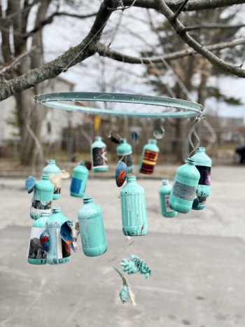 Intercultural Community Center, Westbrook (wind chime made from a bike wheel, glass bottles, and found natural items). (Photo courtesy ecomaine)