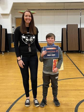 Logan Atwood receives the Principal’s Award from Principal Ainslee Riley. (Photo courtesy Thomaston Grammar School)