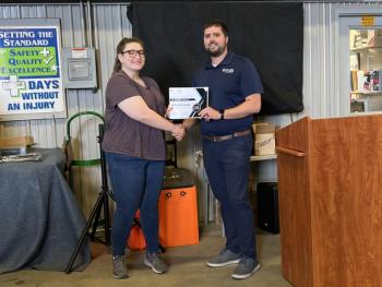 Samantha Jones receives scholarship certificate from Thomas Kennedy II. (Photo courtesy Steel-Pro Incorporated)