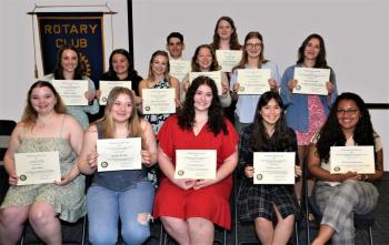 Recipients of the 2023 Belfast Rotary Club scholarships pose for a group photo after the 13 recipients were awarded $80,000, in amounts of $5,000 to $10,000, at the Club’s scholarship banquet held May 25 at the University of Maine Hutchinson Center. Pictured are (left to right), front row: Jacey Bock, Abigail Brown, Grace Scharlacken, Dakota Jones, Savannah Springer; second row: Sydney Vogel, Brynne Sawyer, Audra Faulkingham, Mia Winslow, Greta Ahlefeld, Maiara Rebordão; back row: Cole Ellis, Kricket Thompson. (Photo courtesy Belfast Rotary Club)