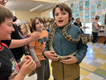 Mr. Drew brought a variety of animals including two snakes, some lizards, a scorpion, Madagascar hissing cockroaches, a tarantula, a turtle, and a 50-pound tortoise named Tank. (Photo courtesy Brenda Thomas)