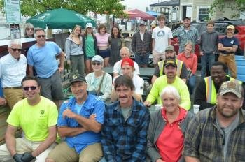 Friday, June 30, Camden Public Works employees, along with Camden Hills Regional High School students, their teacher, plus Conservation Commission members, the harbor master and contractors assembled to celebrate the Boardwalk to Picnic Table project. Back row, left to right: Sadie Woodruff, Laura Riordan, Ruth Weiss, Ina Wolovitz, Eric LeBlond, Griffin Spear, Danny Salomon, Ward Morrison, Jess Scott; middle to front, left to right, Brian Lightbody, Pamela Gleason, Wayne Rustwick, Barbara Lawrence, Adam Scott, Nick Cushman, Alden, Vinny Kwiatkowski, Al Andy Simon, Dave St. Laurent, Steve Pixley, Glen Chapman, Janet Halsey and Dan Fuller. (Photo by Lynda Clancy)