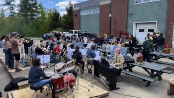 Celebrating the tables at the high school before they were moved to Camden Harbor. (Photo courtesy the Hatchery)