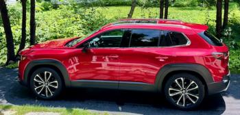 With the new-for-2023 CX-50, Mazda stakes out a spot at the upper end of the two-row SUV market. This color is Red Crystal Metallic.