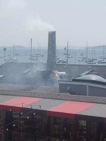 Initially, flames were spotted breaking through the chimney. (Photo courtesy Ralph Eriksson)