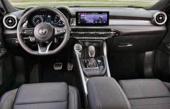 Alfa Romeo goes its own way with switches and controls—note the starter button on the left side of the steering wheel—but everything is driver-focused and easy to use.