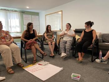 Ninth Grade Trekkers student, Ada, explains rules of a team consensus process in Elevating Youth Voice and Choice, August 2023. (Photo courtesy Trekkers)
