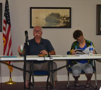 Owls Head Select Board members Gordan Page and Linda Post wait for the Aug. 21, 2023 Board meeting to begin. This was Page’s last meeting as a Board member. (Photo by Sarah Thompson)