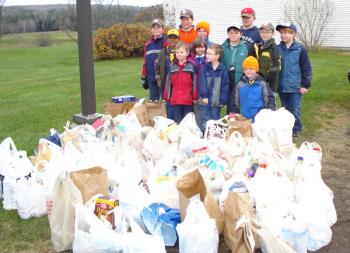 Farmington Area Scouts collected 142 bags of food for the needy in 2011. (Photo courtesy Chuck Mahaleris)