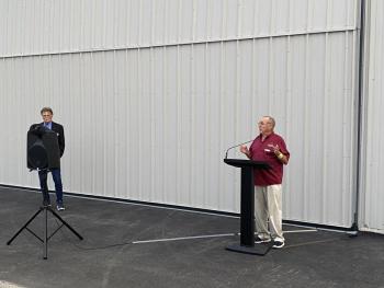 Bud Woodworth speaks at the event. (Photo by by Louis Bettcher)