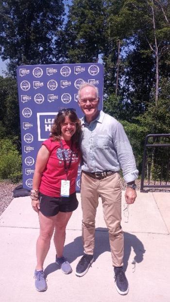 Susan Shoberg, Scoutmaster for the female Scouts who attended the Jamboree from Pine Tree Council, meeting guest speaker Scott Pelley of CBS News and 60 Minutes. Shoberg, who lives in Windham, is the volunteer District Commissioner serving Scouting in Androscoggin and Oxford Counties. (Photo courtesy Chuck Mahaleris)
