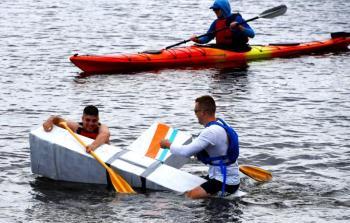 The Coasties” team had a bit of trouble during the August 20 Cardboard Boat Race at Belfast Rotary Club’s Harbor Fest on August 20. (Photo courtesy Phil Carthage, Belfast Rotary Club)