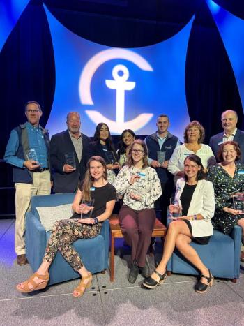 Some of the 2023 Commitment Awards winners pose with President & CEO Greg Dufour. Back row (L-R): Marvin "Larry" Merritt, Greg Sirois, Genna Williamson, Nashelee Monroy, Garrett Alofs, Lori Theriault, Greg Dufour. Front row (L-R): Heidi Lawson, Sydney Cough, Viktorie Mathiau, Victoria Foust. (Photo courtesy Camden National Bank)