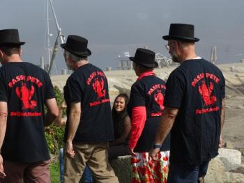 The barons head down to the waterfront to bring Passy Pete back to the cermony. (photo by Erica Thoms)