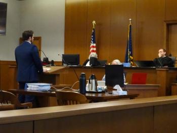Seth Russell, attorney for the plaintiffs, speaks to Justice Murray. (photo by Erica Thoms)