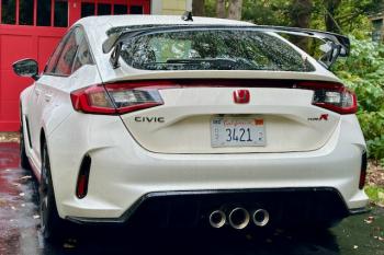 The front-wheel-drive Civic Type R, with its basket-handle spoiler, triple trumpets, power and sharp handling, is the epitome of the Hot Hatch. Yet it remains a capable small family car and grocery-getter too, and the spoiler doesn’t obstruct the view aft.
